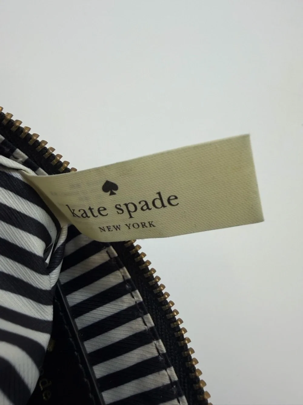 Kate Spade Black Leather Wristlet Bow Strap Gold Spade Logo  GUC